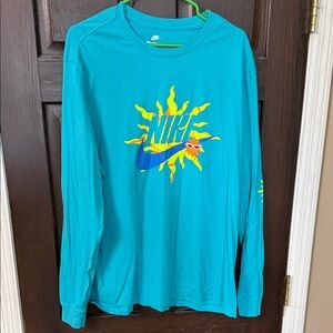 Nike Turquoise Long Sleeve with Sunburst Design